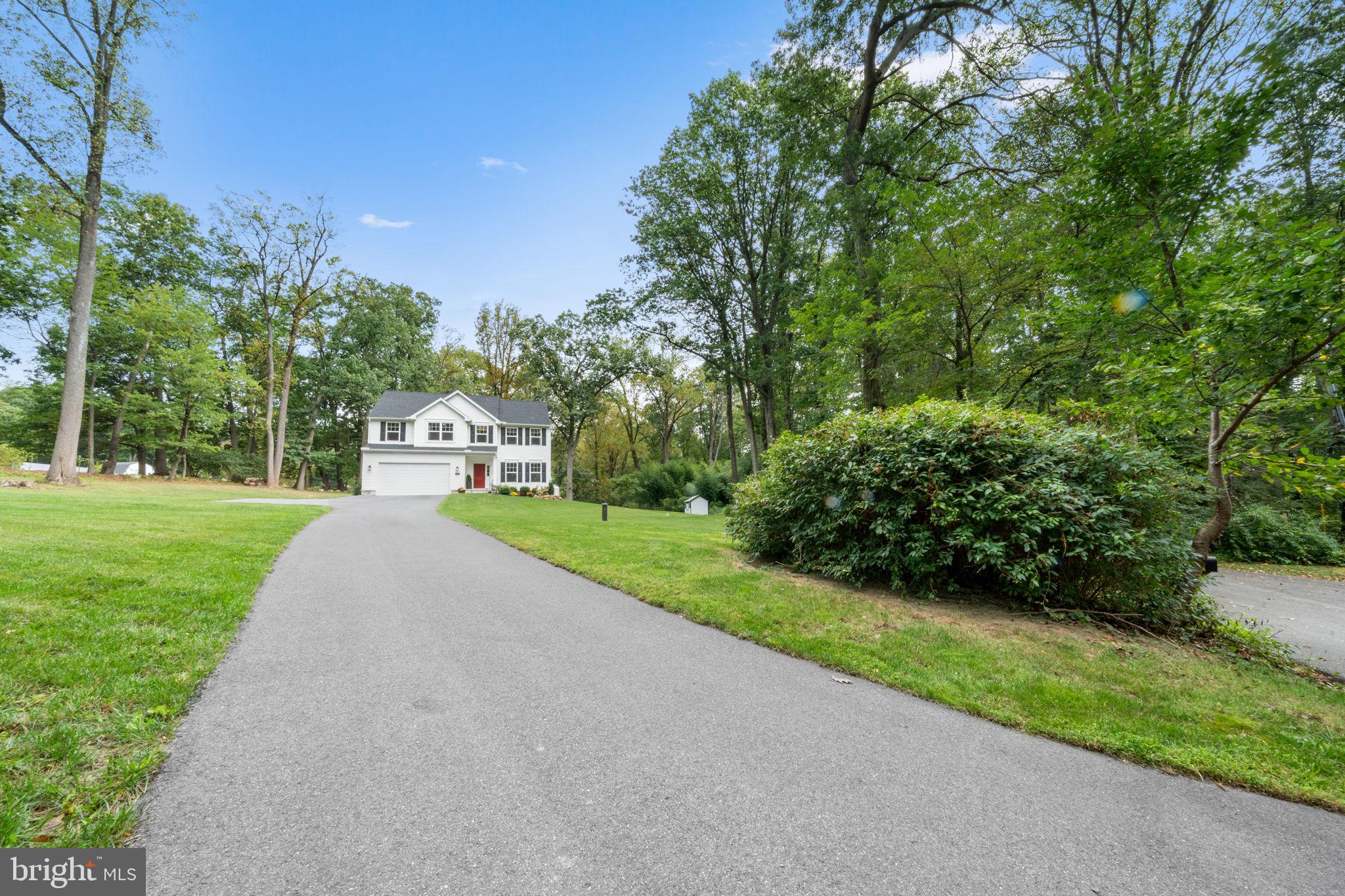 611 Grouse Road Exton, PA 19341 - Photo 4 of 59 a childrens park with lots of green space and trees