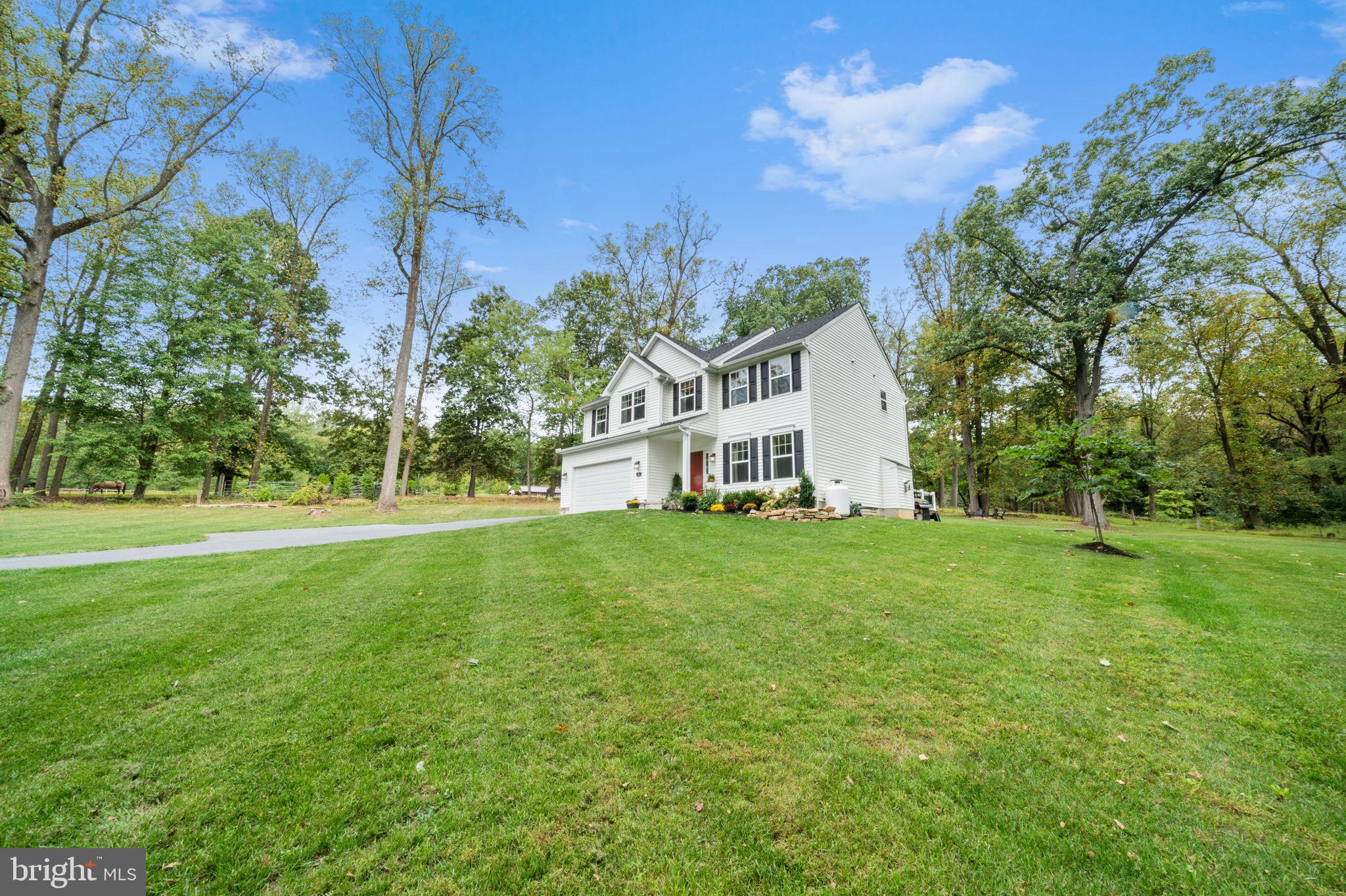 611 Grouse Road Exton, PA 19341 - Photo 5 of 59 a view of a house with a yard
