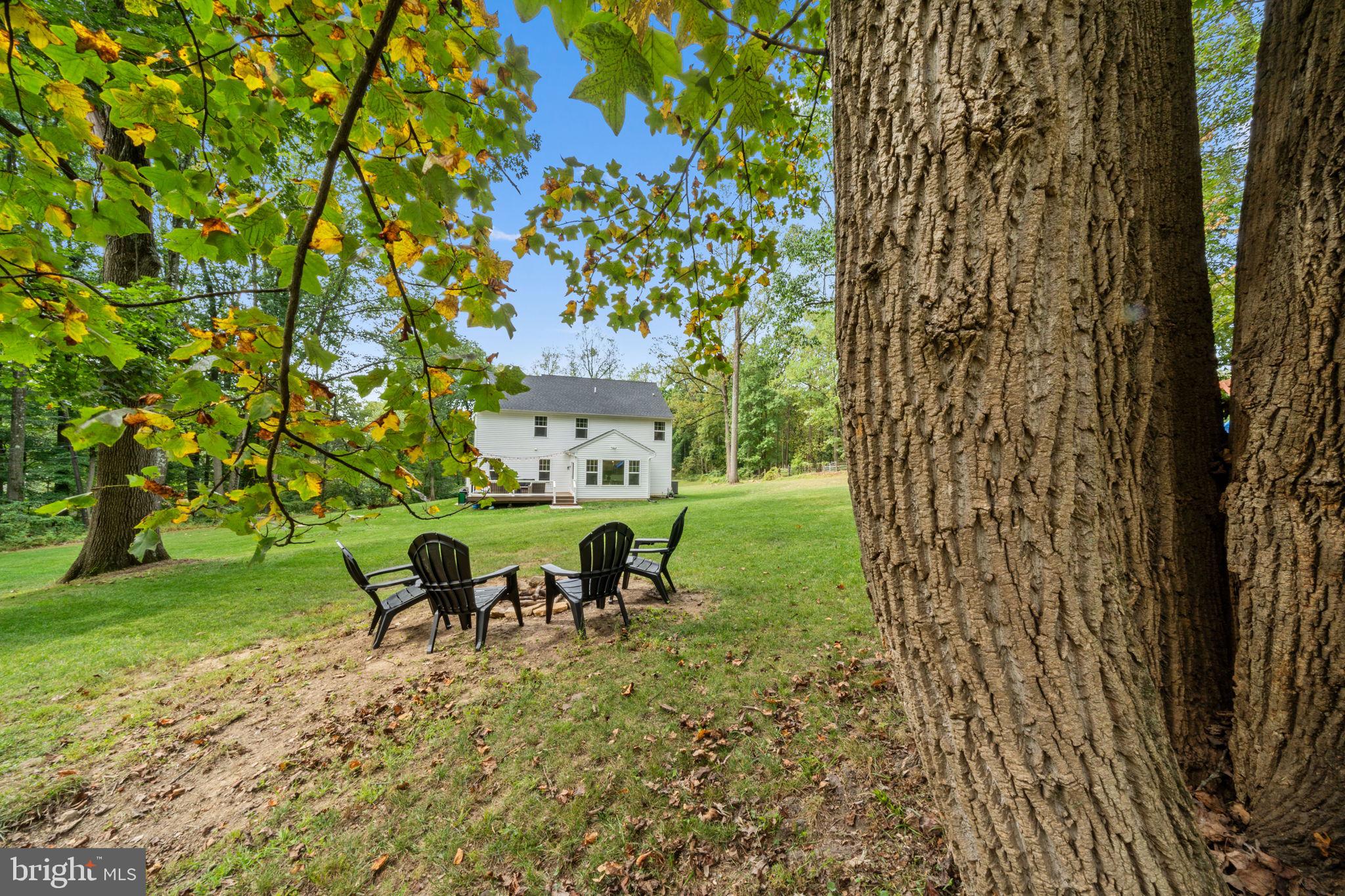 611 Grouse Road Exton, PA 19341 - Photo 52 of 59 a view of a chairs and table in a yard