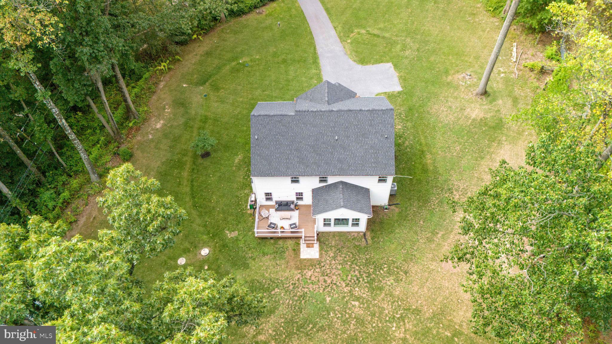 611 Grouse Road Exton, PA 19341 - Photo 54 of 59 a view of a house with a yard