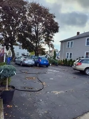 a view of street with parked cars
