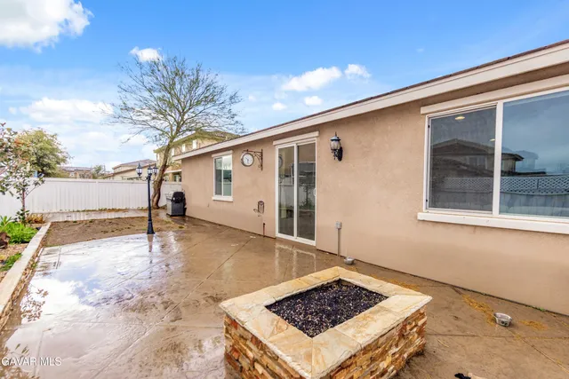 a view of a backyard of a house