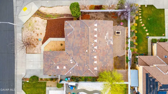 a aerial view of a house with swimming pool