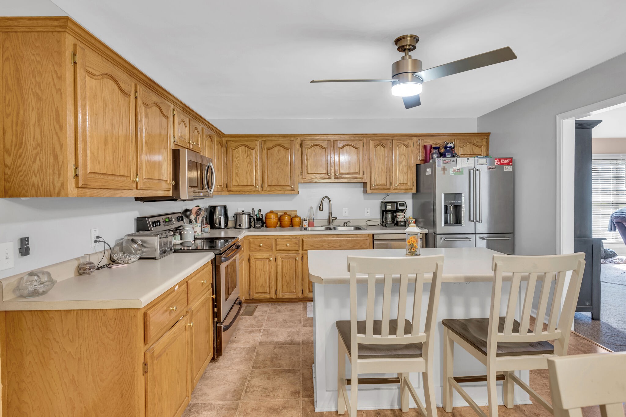 156 Foxrun Springfield, TN 37172 - Photo 13 of 31 a kitchen with a sink stove and cabinets