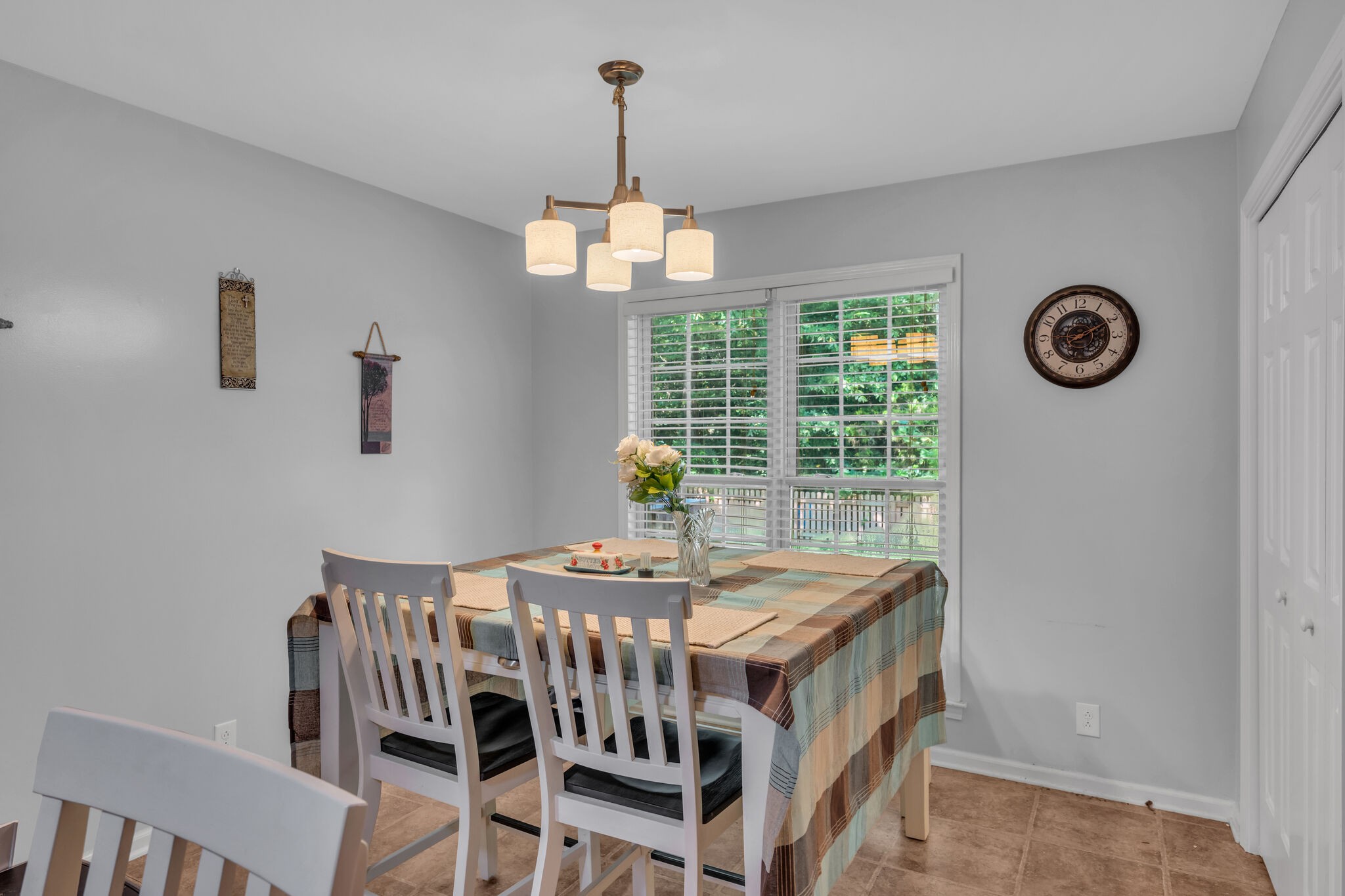 156 Foxrun Springfield, TN 37172 - Photo 17 of 31 a dining room with a wooden table and chairs