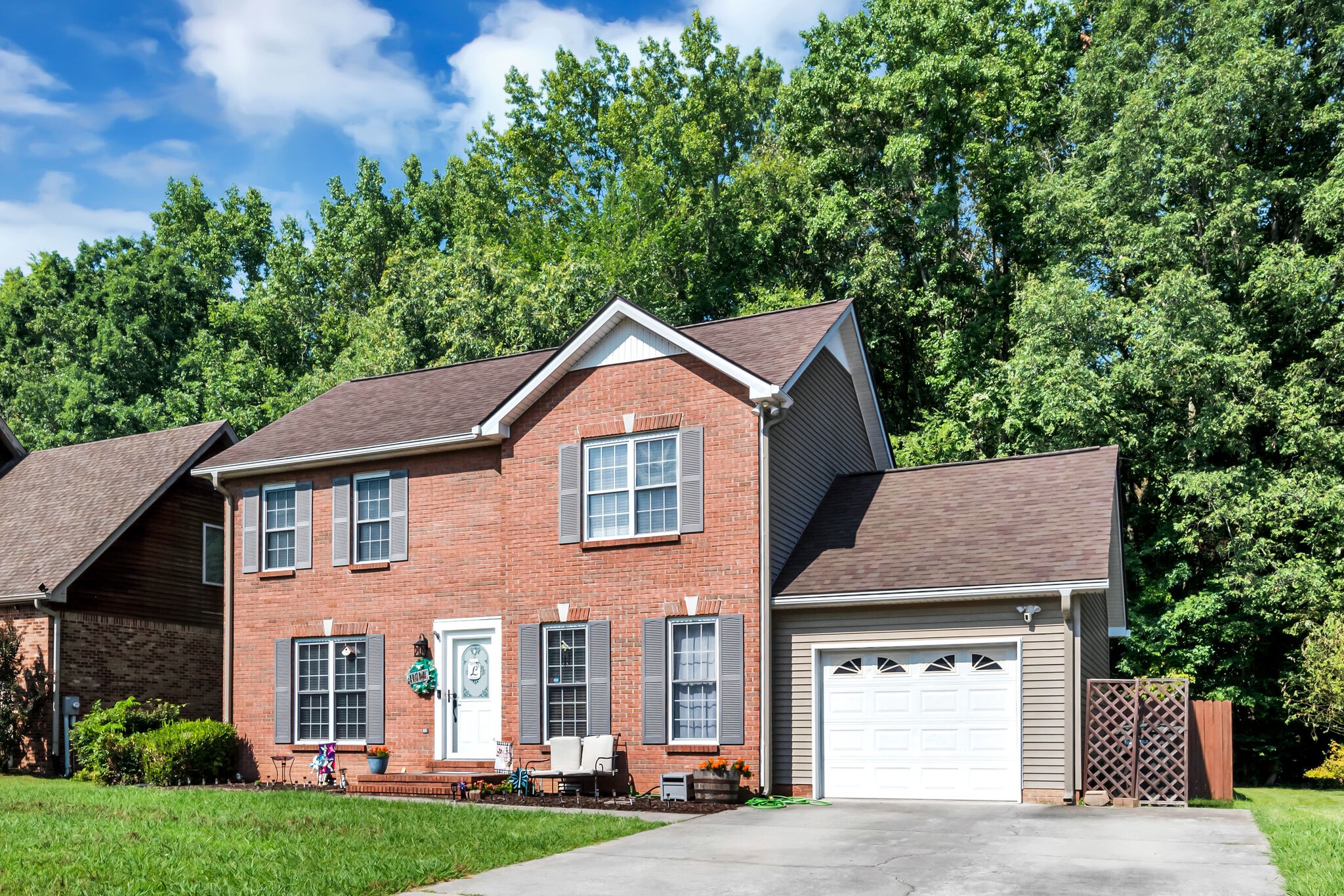156 Foxrun Springfield, TN 37172 - Photo 2 of 31 a front view of a house with a yard