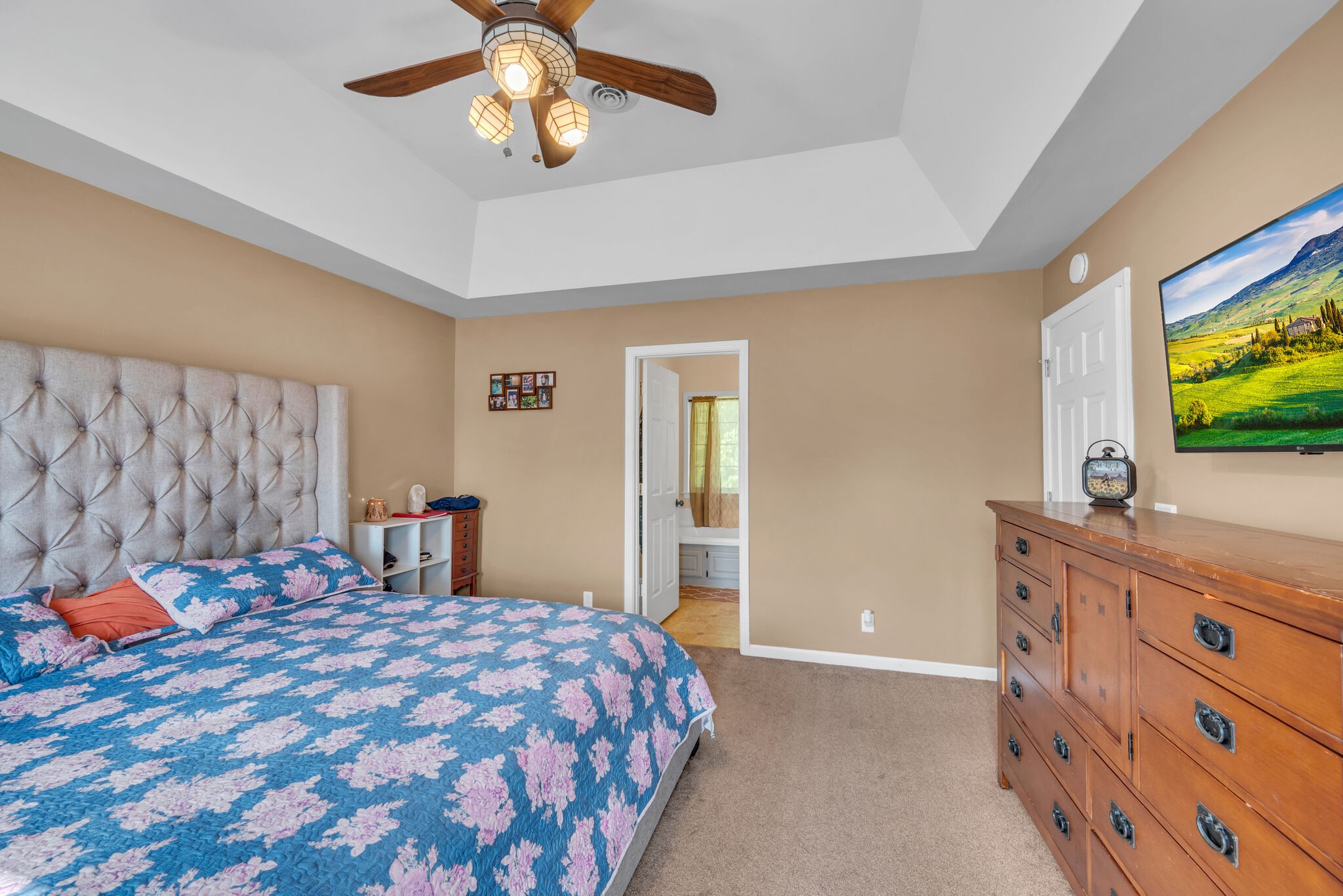 156 Foxrun Springfield, TN 37172 - Photo 21 of 31 a bedroom with a bed and a flat tv screen on dresser