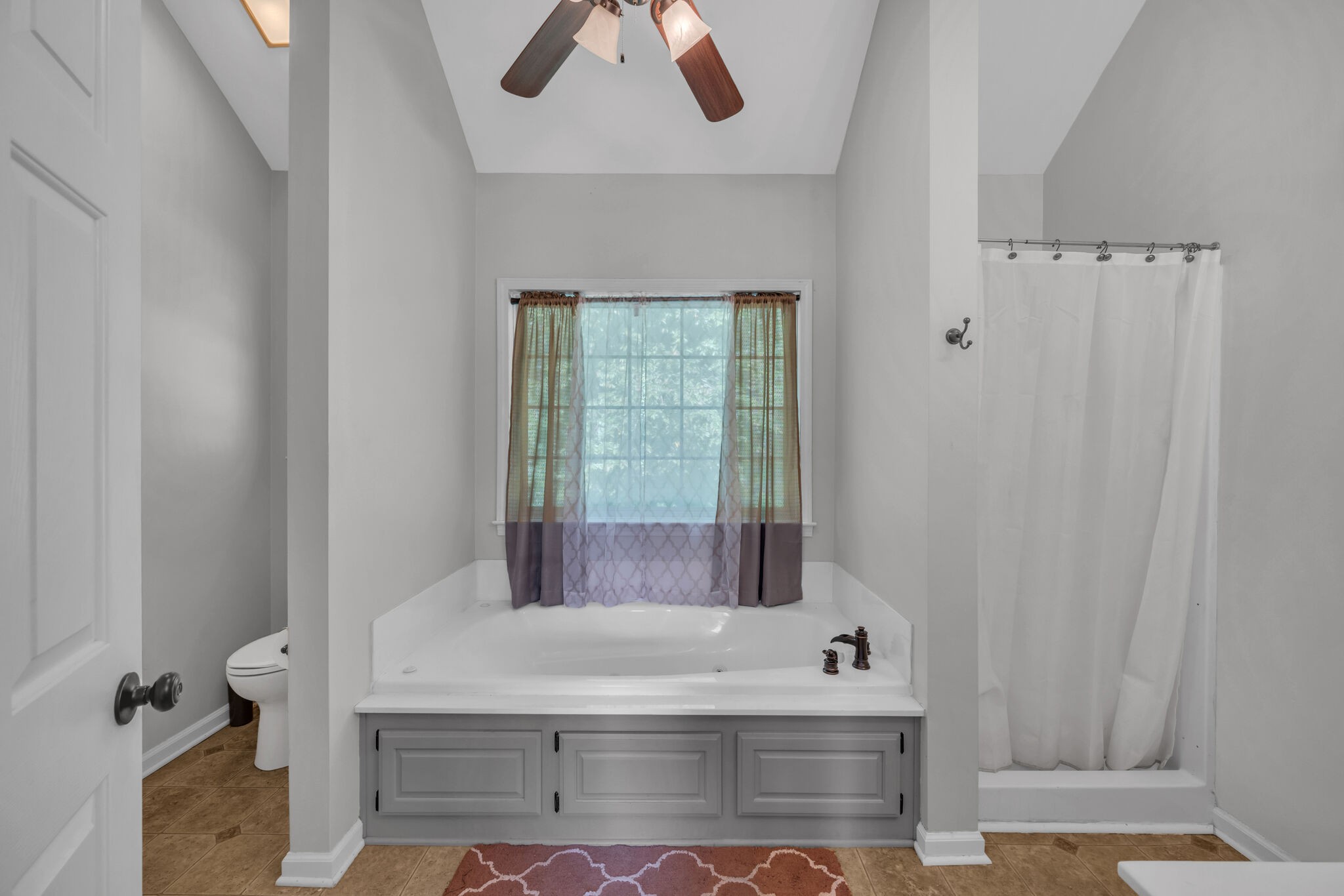 156 Foxrun Springfield, TN 37172 - Photo 22 of 31 a bathroom with a bathtub and shower