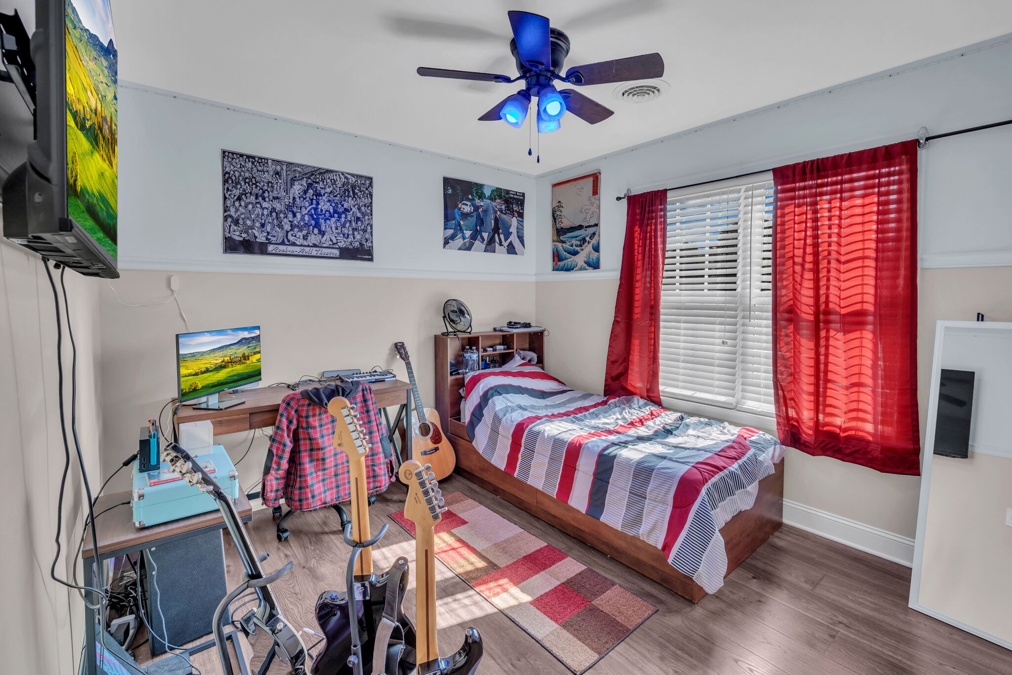 156 Foxrun Springfield, TN 37172 - Photo 26 of 31 a bedroom with a bed and a chandelier