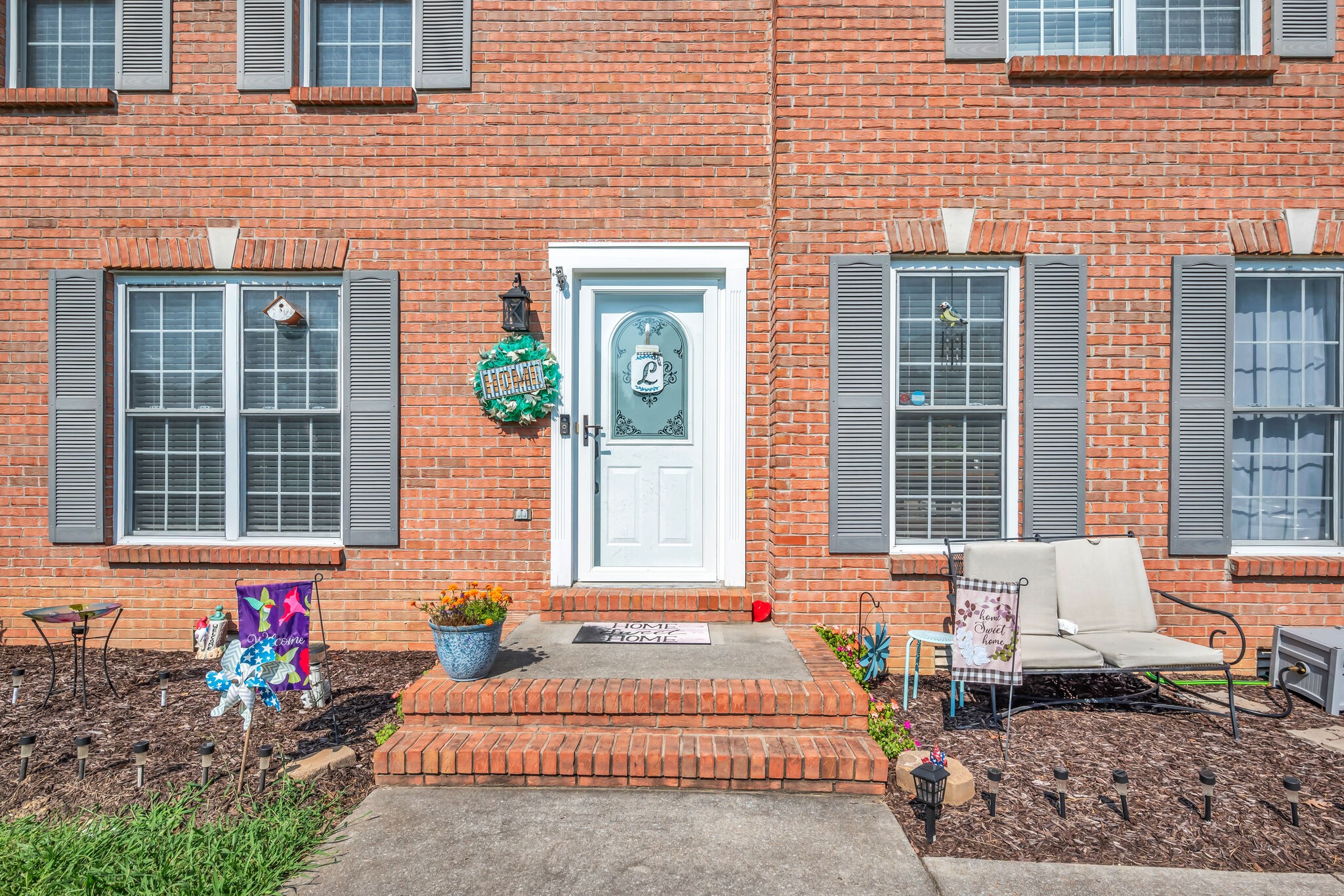 156 Foxrun Springfield, TN 37172 - Photo 4 of 31 a front view of a house with many windows
