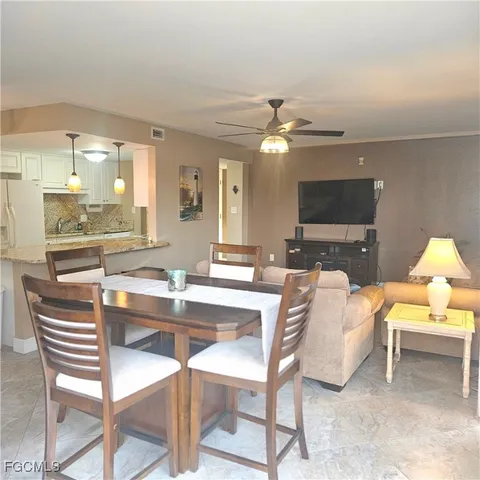 a view of a dining room with furniture