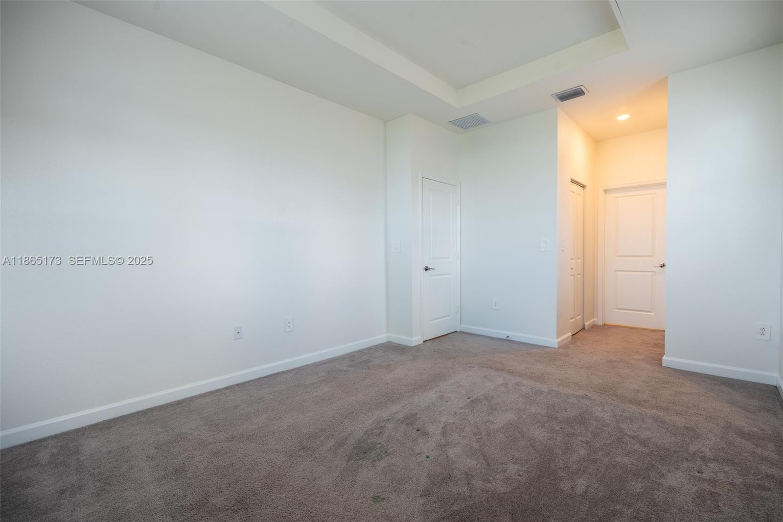 24720 Southwest 119th Place, Unit 24720 Homestead, FL 33032 - Photo 21 of 30 an empty room with a window