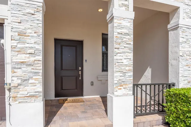 a view of entryway with stairs