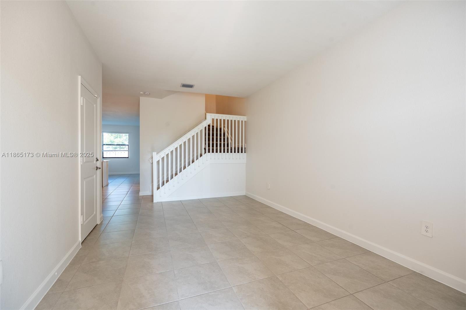 24720 Southwest 119th Place, Unit 24720 Homestead, FL 33032 - Photo 6 of 30 a view of an empty room