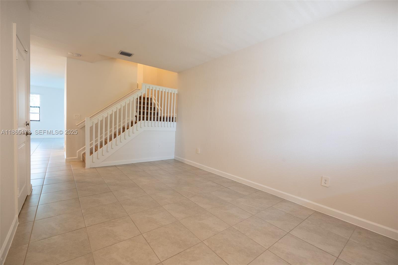 24720 Southwest 119th Place, Unit 24720 Homestead, FL 33032 - Photo 7 of 30 a view of an entryway