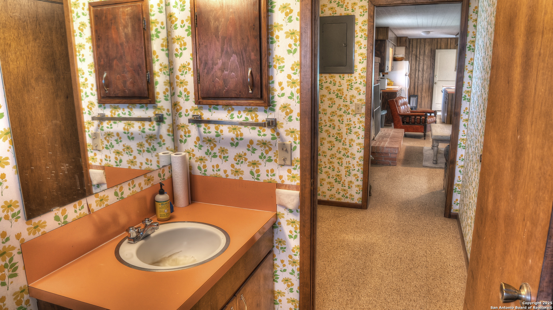 154 Weston Road Leakey, TX 78873 - Photo 28 of 39 a bathroom with sinks a mirror and a shower