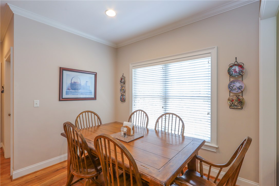 103 C-10-147D Anderson, SC 29621 - Photo 15 of 49 A well-lit dining area offers a welcoming space for meals and gatherings.