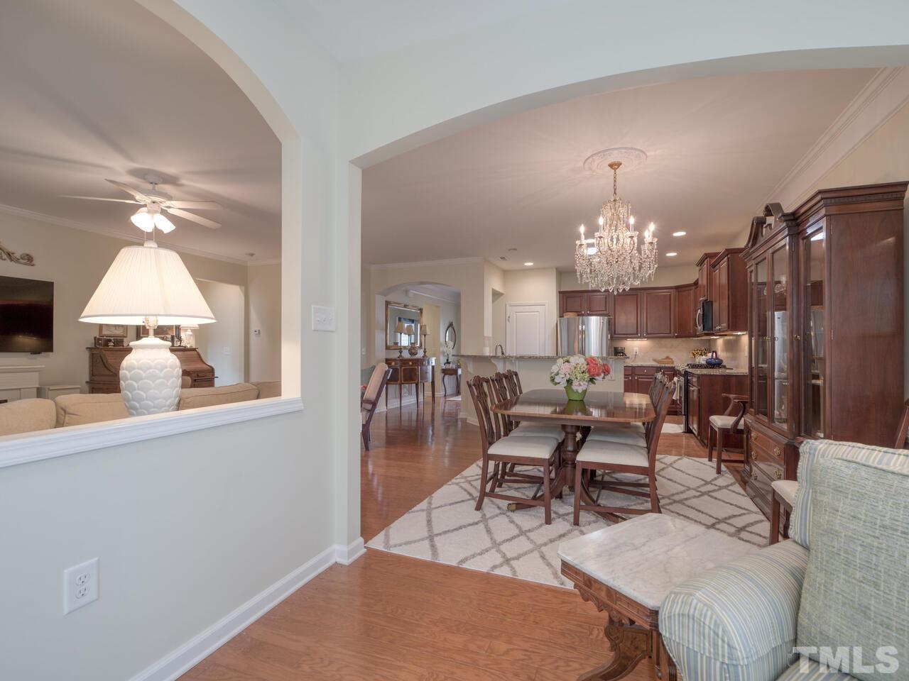 724 Eldridge Loop Cary, NC 27519 - Photo 11 of 38 a view of a dining room with furniture