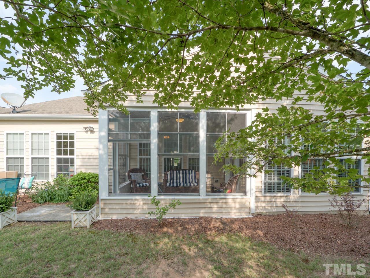 724 Eldridge Loop Cary, NC 27519 - Photo 35 of 38 front view of a house with a yard