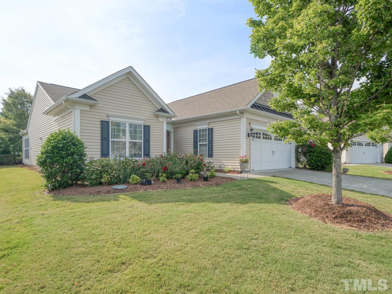 724 Eldridge Loop Cary, NC 27519 - Photo 38 of 38 a front view of a house with garden