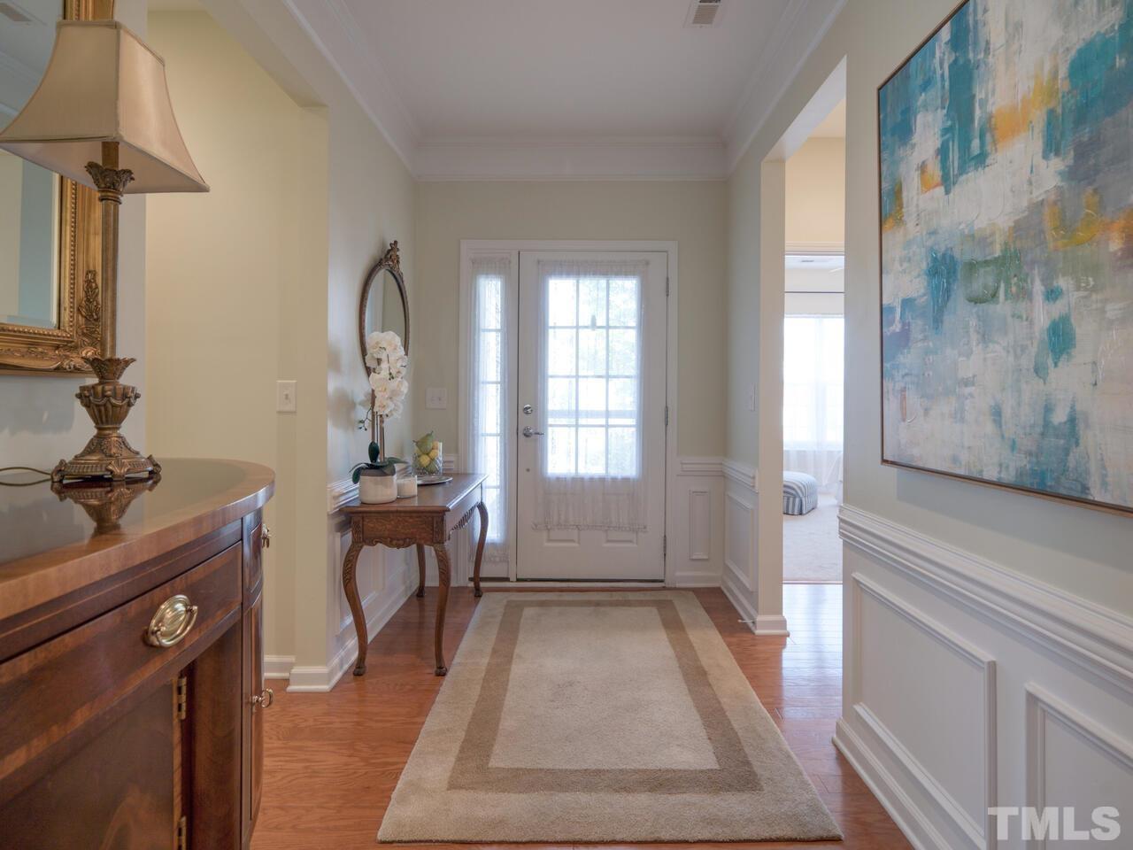 724 Eldridge Loop Cary, NC 27519 - Photo 5 of 38 a view of a room with gym equipment