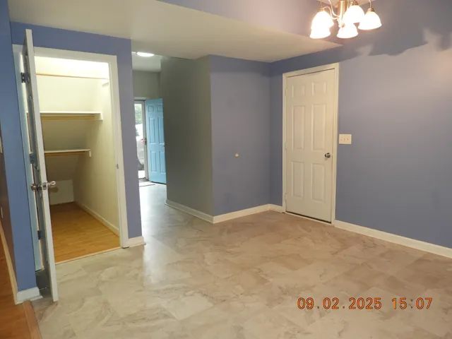 a view of a big yard with an outdoor space