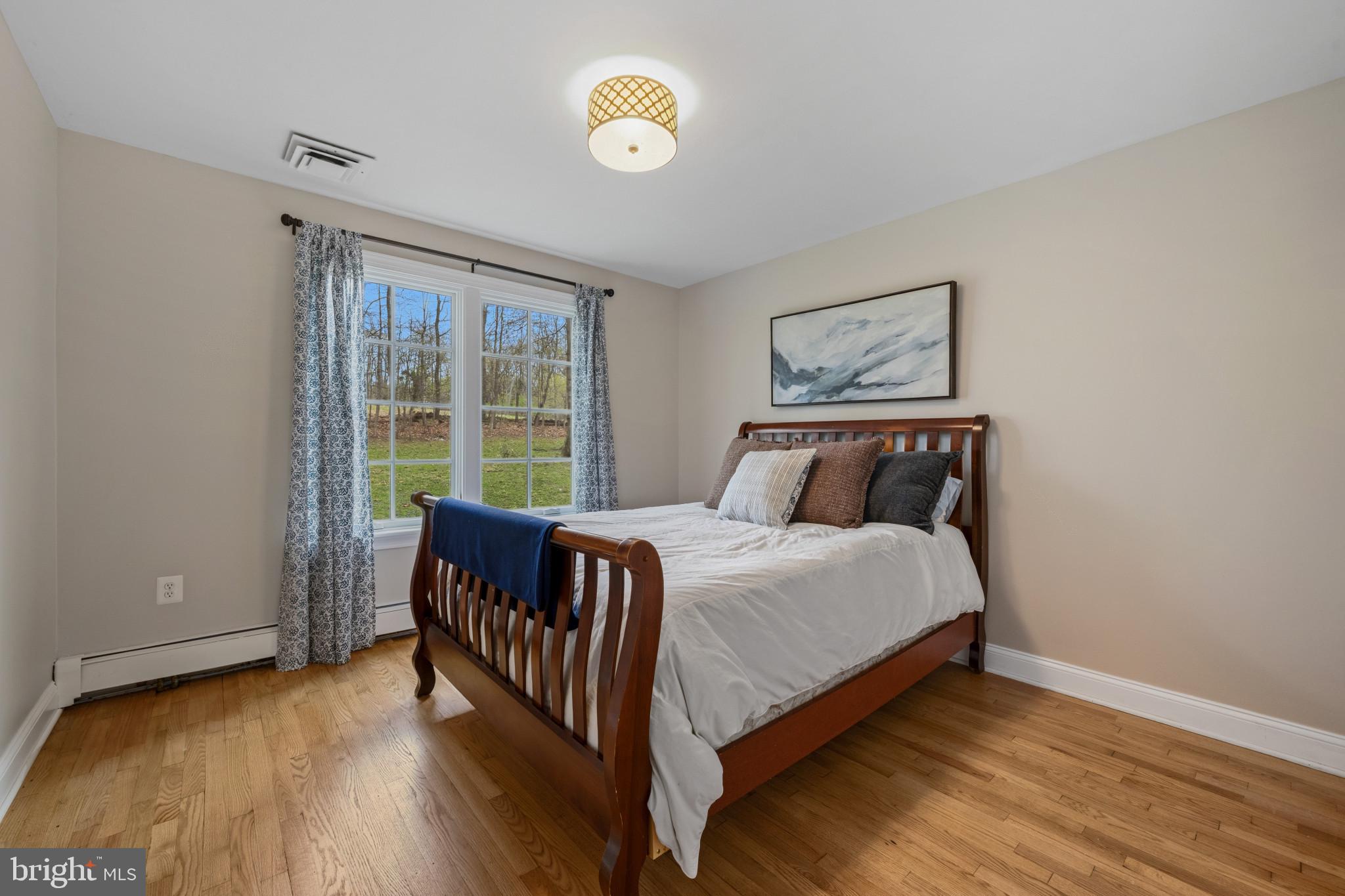 14111 Longnecker Road Glyndon, MD 21136 - Photo 22 of 51 Serene bedroom with natural light.