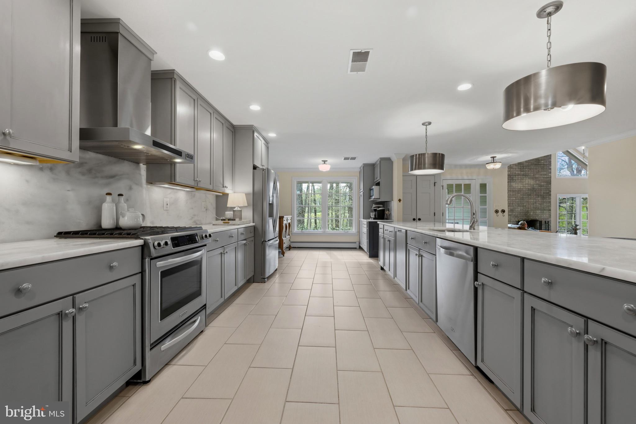 14111 Longnecker Road Glyndon, MD 21136 - Photo 34 of 51 Modern kitchen with sleek finishes.
