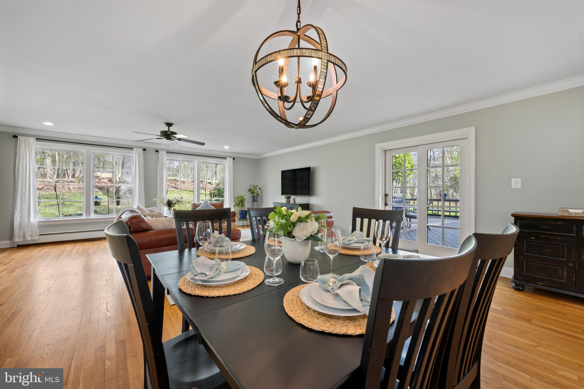 14111 Longnecker Road Glyndon, MD 21136 - Photo 40 of 51 Elegant dining in a sunlit space.