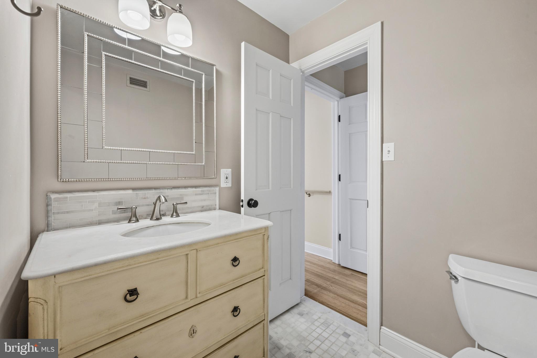 14111 Longnecker Road Glyndon, MD 21136 - Photo 44 of 51 Charming bathroom with modern touches.