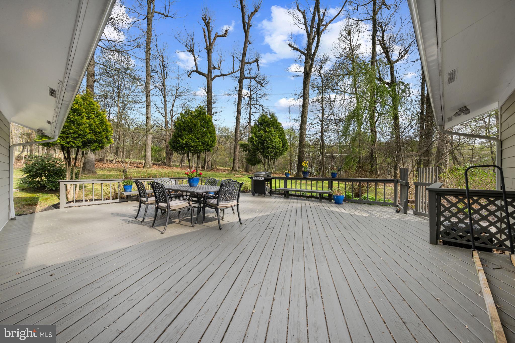 14111 Longnecker Road Glyndon, MD 21136 - Photo 48 of 51 Serene deck with nature's embrace.