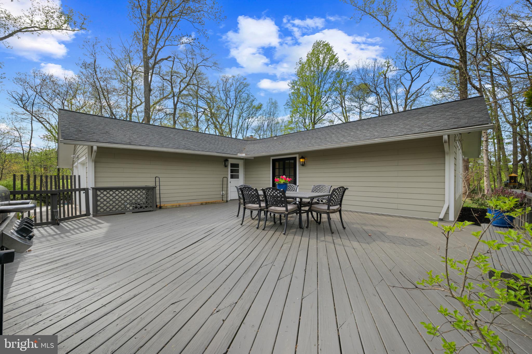 14111 Longnecker Road Glyndon, MD 21136 - Photo 49 of 51 Serene deck nestled in nature's embrace.