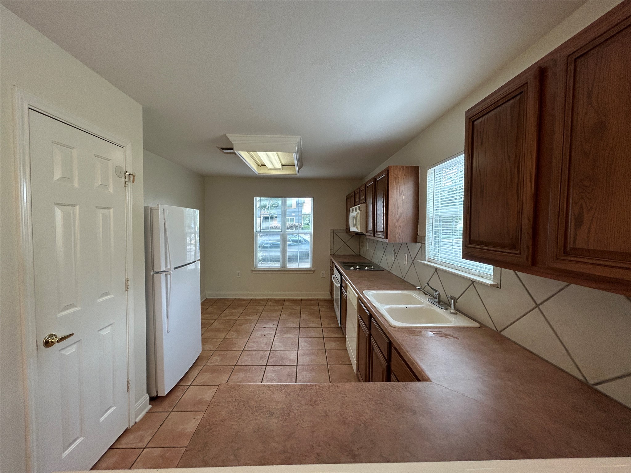 1909 Tranquilo Trail Austin, TX 78744 - Photo 3 of 14 Spacious kitchen includes refrigerator