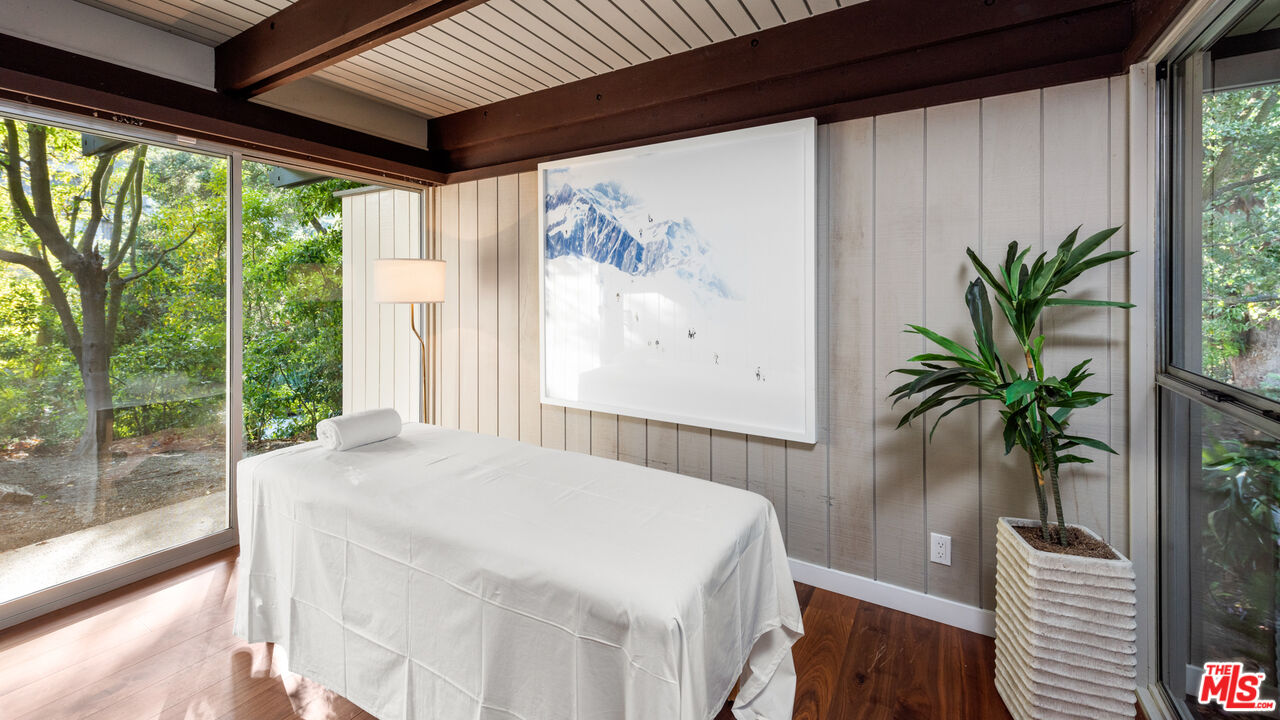 1030 Rivas Canyon Road Pacific Palisades, CA 90272 - Photo 19 of 42 a very nice looking room with a large window with the outer view