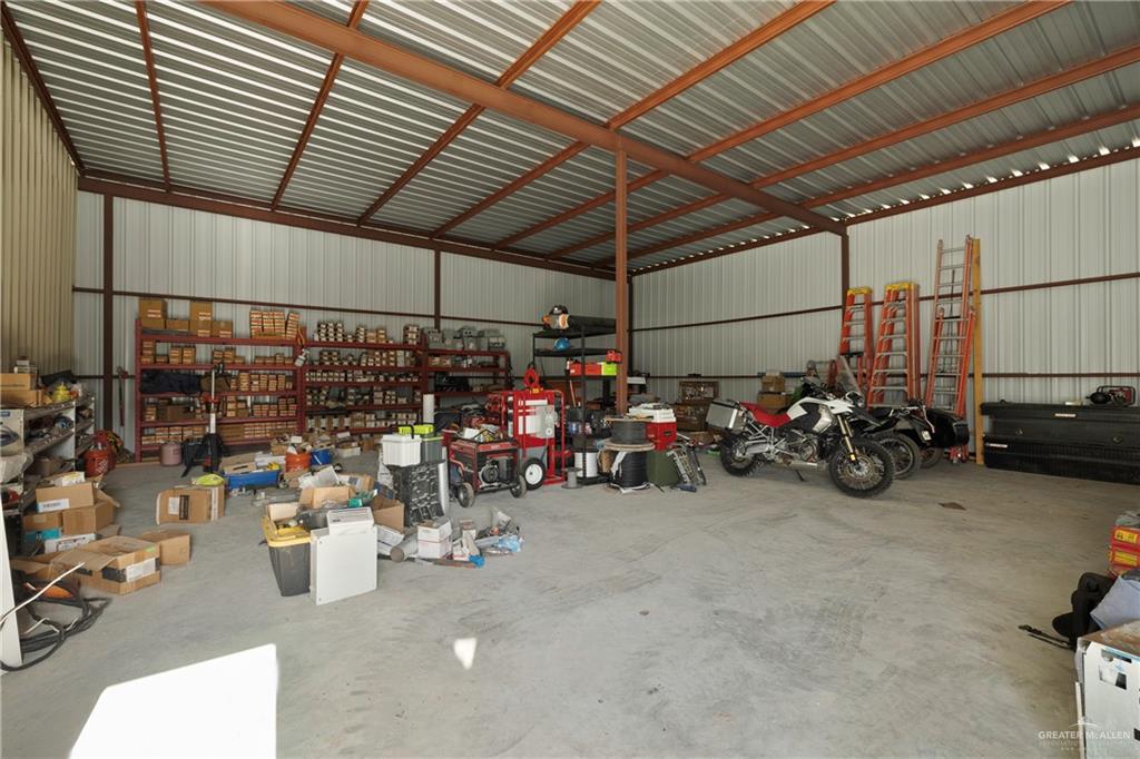 4407 North Raul Longoria Road San Juan, TX 78589 - Photo 18 of 22 a view of a storage room with gym equipment