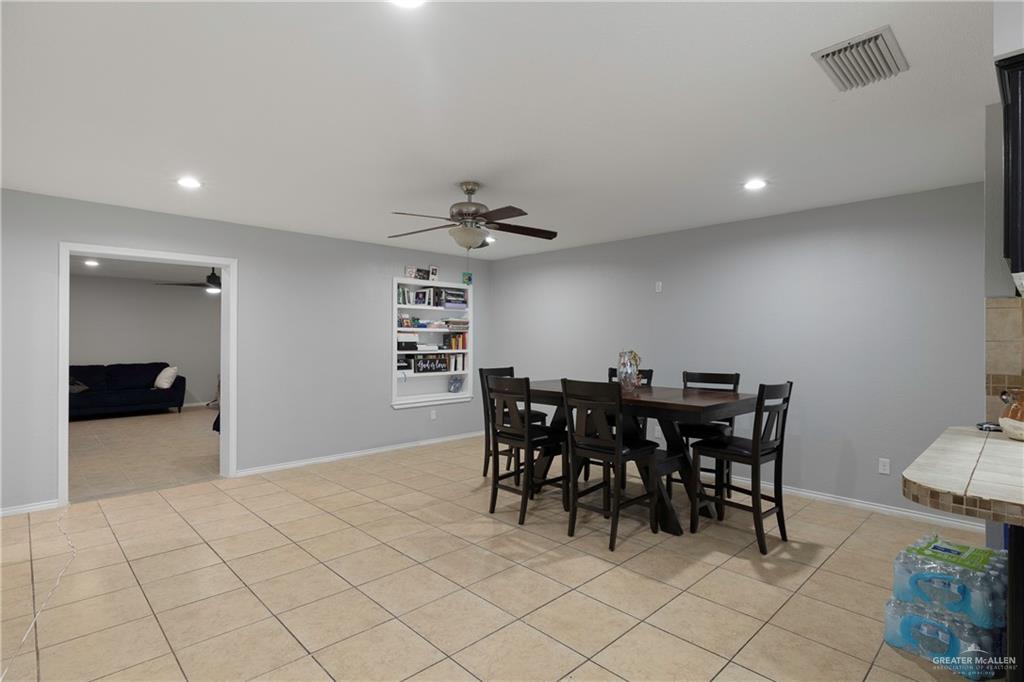4407 North Raul Longoria Road San Juan, TX 78589 - Photo 4 of 22 a view of a dining room with furniture