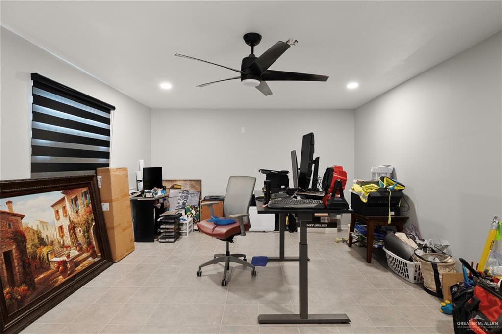 4407 North Raul Longoria Road San Juan, TX 78589 - Photo 8 of 22 a view of a workspace with furniture
