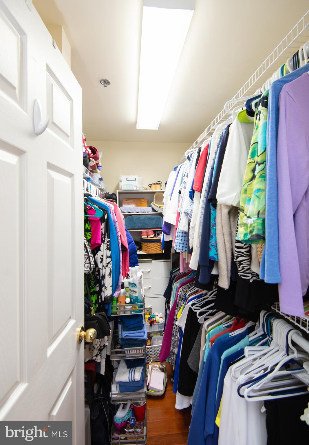 304 Academy Street, Unit 202 Cambridge, MD 21613 - Photo 17 of 40 Primary BR walk-in closet