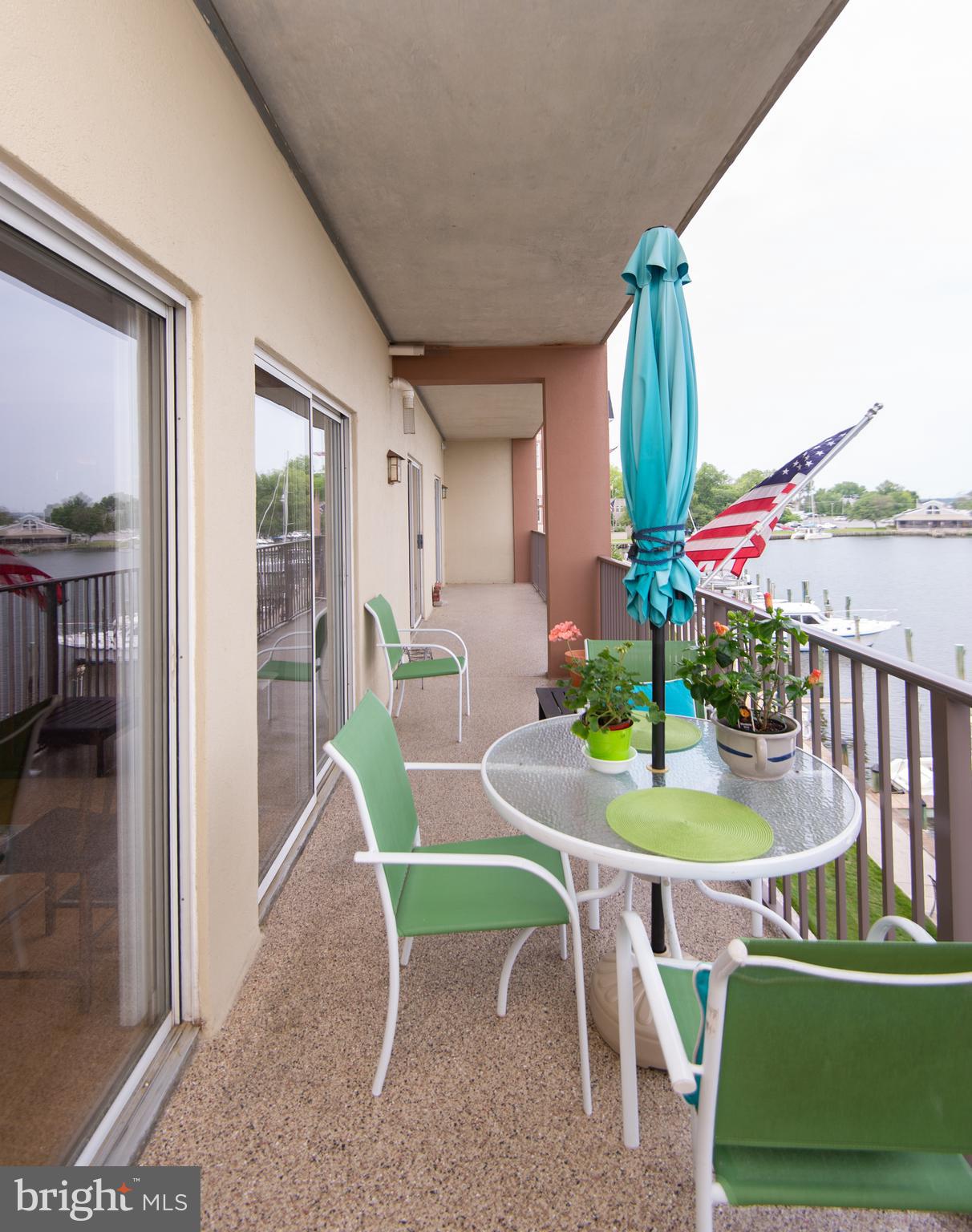 304 Academy Street, Unit 202 Cambridge, MD 21613 - Photo 2 of 40 Balcony accessible from LR and both BRs