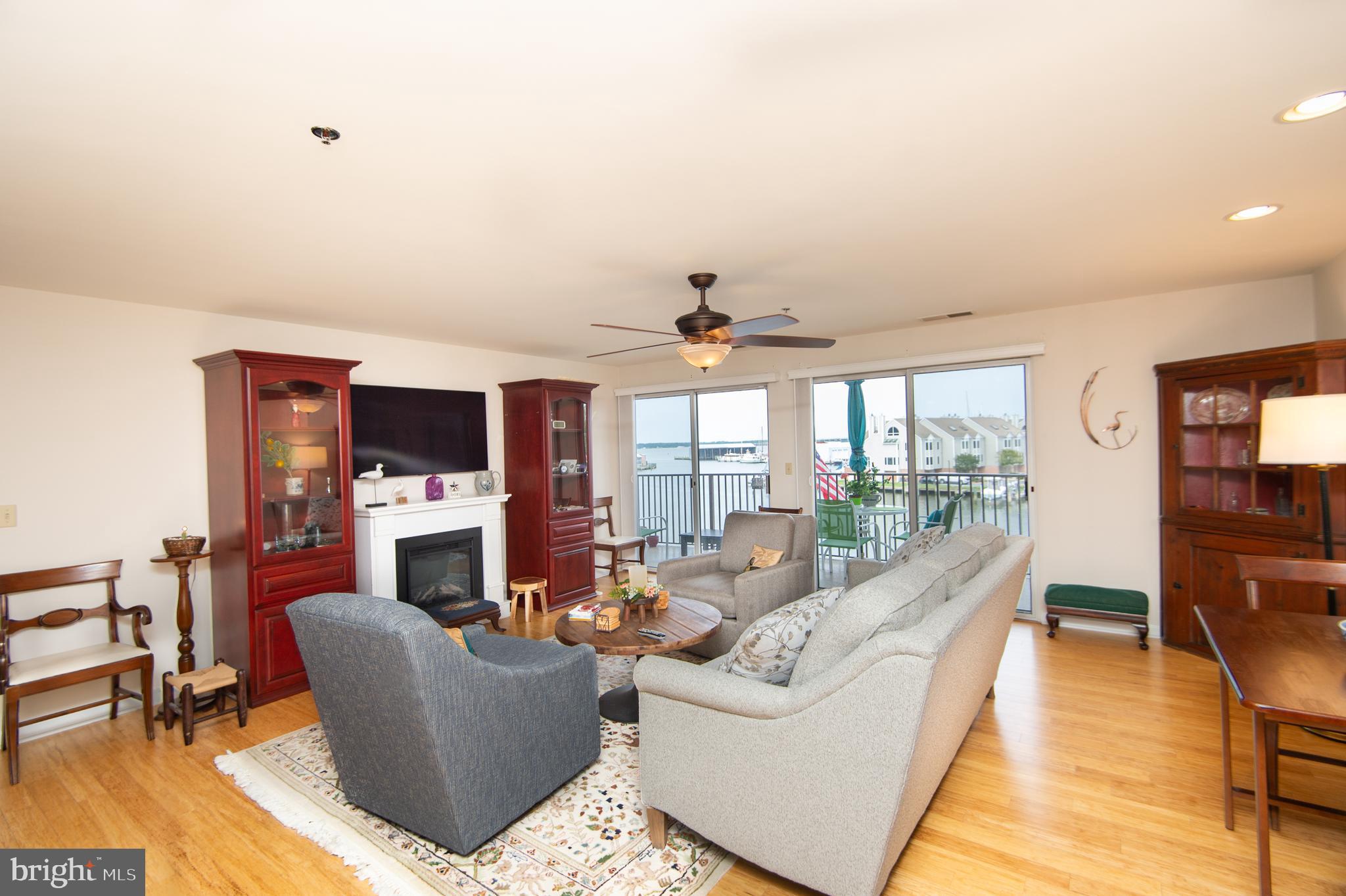 304 Academy Street, Unit 202 Cambridge, MD 21613 - Photo 7 of 40 LR with double sliders to balcony