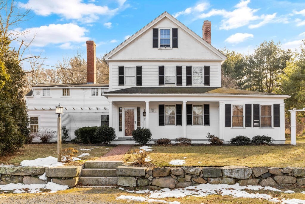213 Boston Post Road Wayland, MA 01778 - Photo 1 of 1 a front view of a house with swimming pool and porch