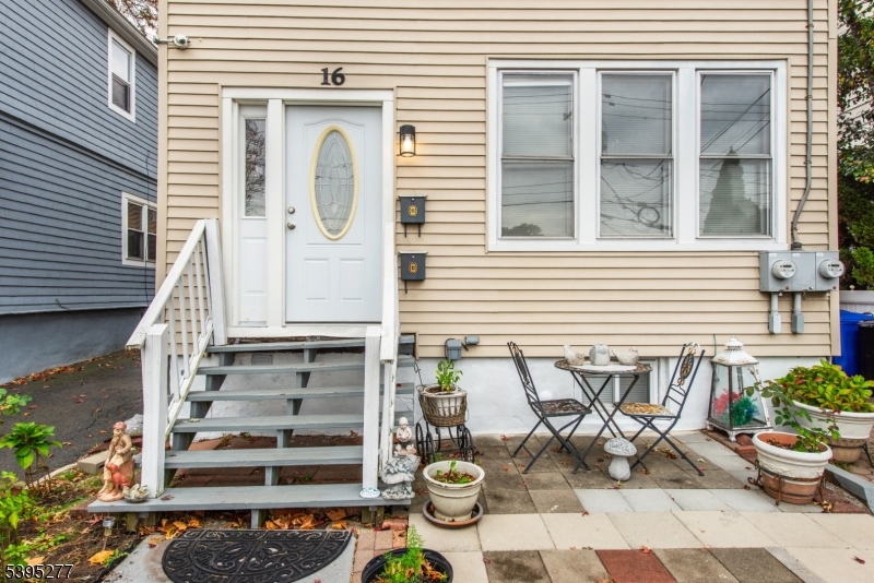16 Willet Street Bloomfield, NJ 07003 - Photo 3 of 19 a front view of a house with patio