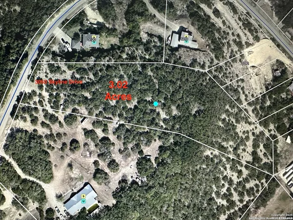 a view of a forest with houses