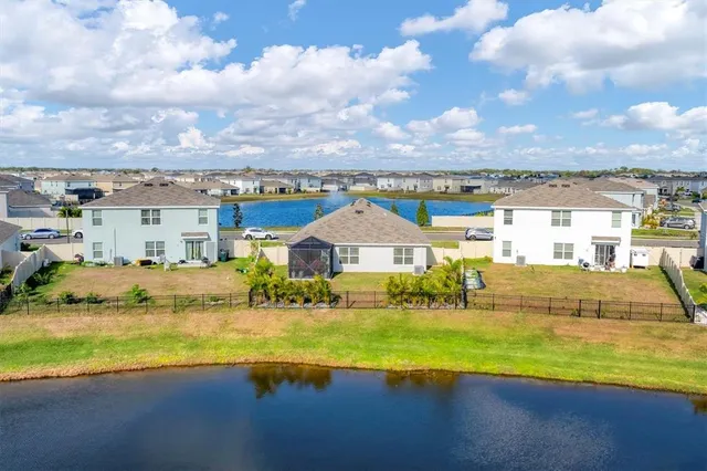 a view of a swimming pool with an ocean view