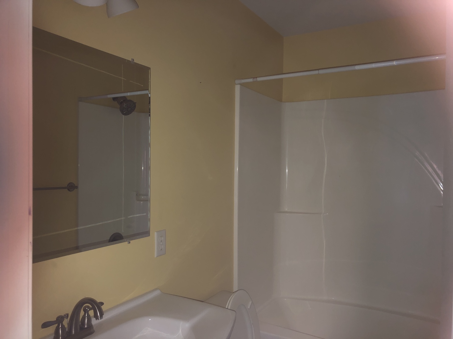 321 North Quincy Street Clinton, IL 61727 - Photo 9 of 12 a bathroom with a shower