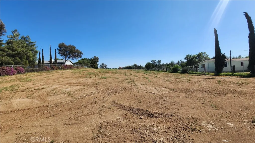 0 West Rider Street Perris, CA 92570 - Photo 11 of 19 a view of a yard with a house