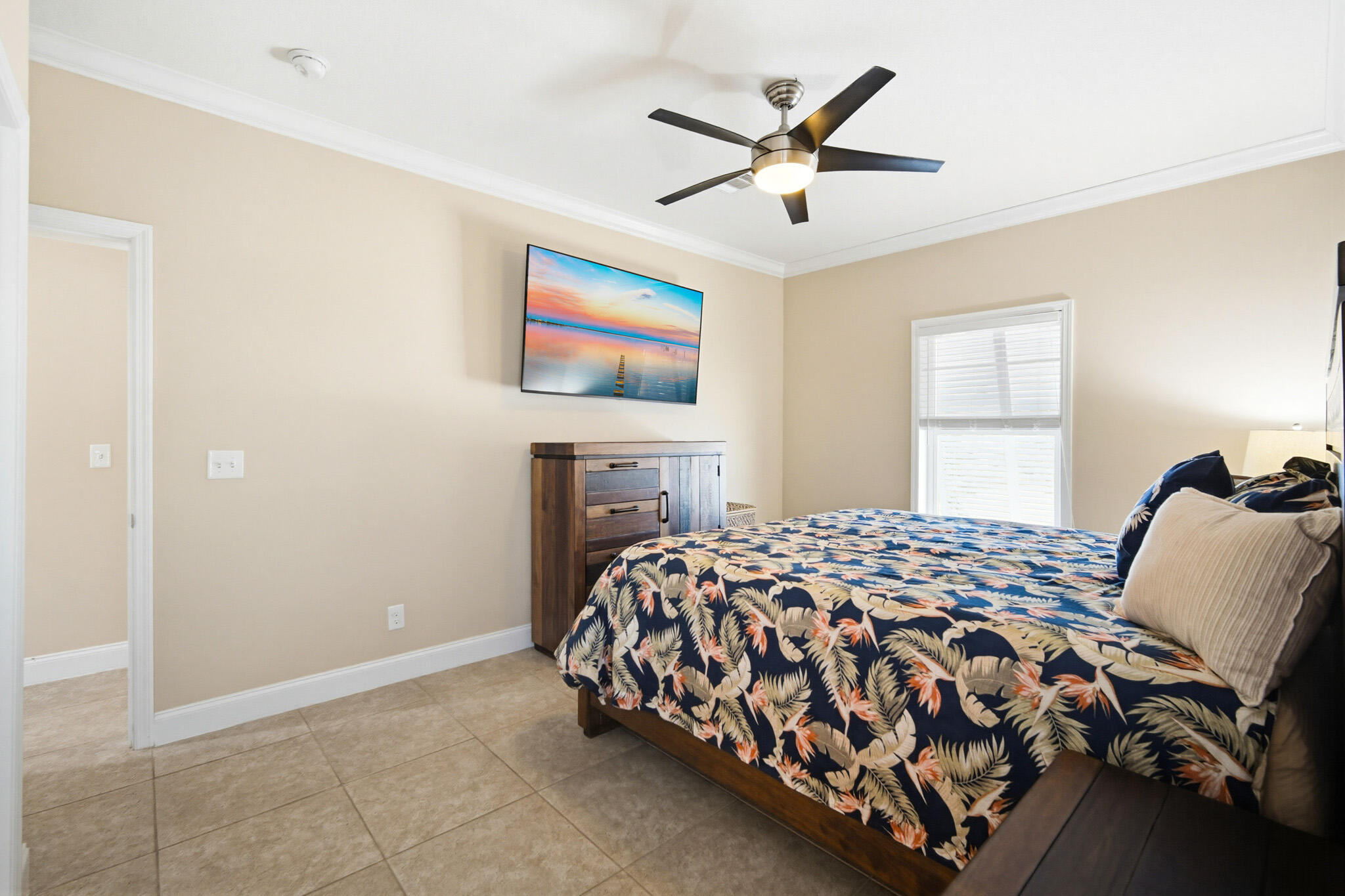 183 Star Lane Key West, FL 33040 - Photo 33 of 70 a bedroom with a bed and a chandelier