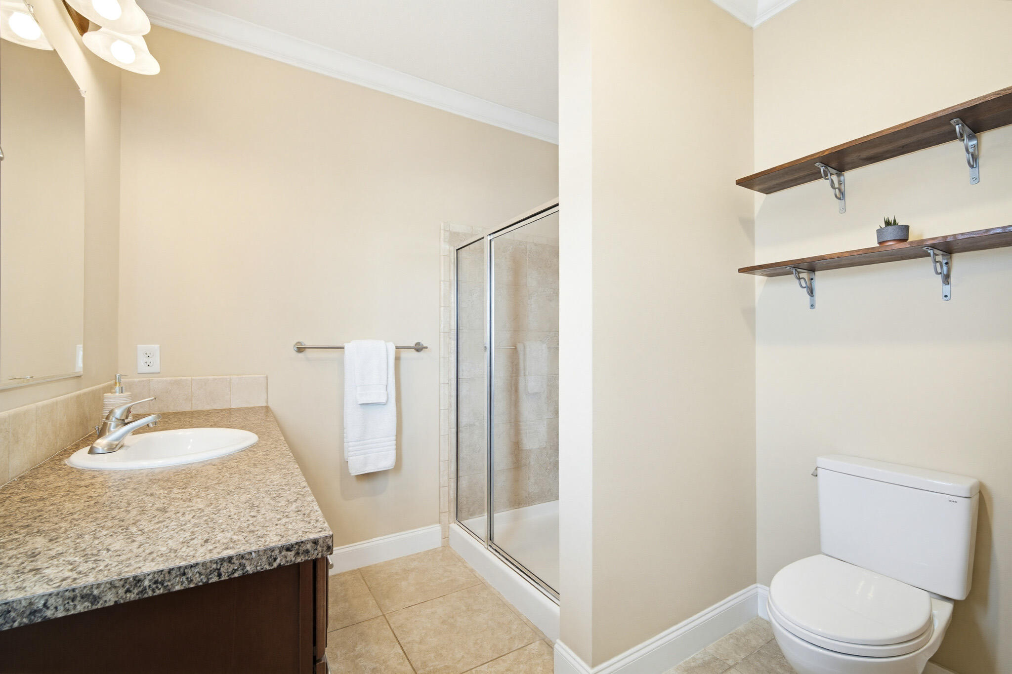 183 Star Lane Key West, FL 33040 - Photo 35 of 70 a bathroom with a granite countertop sink and a mirror