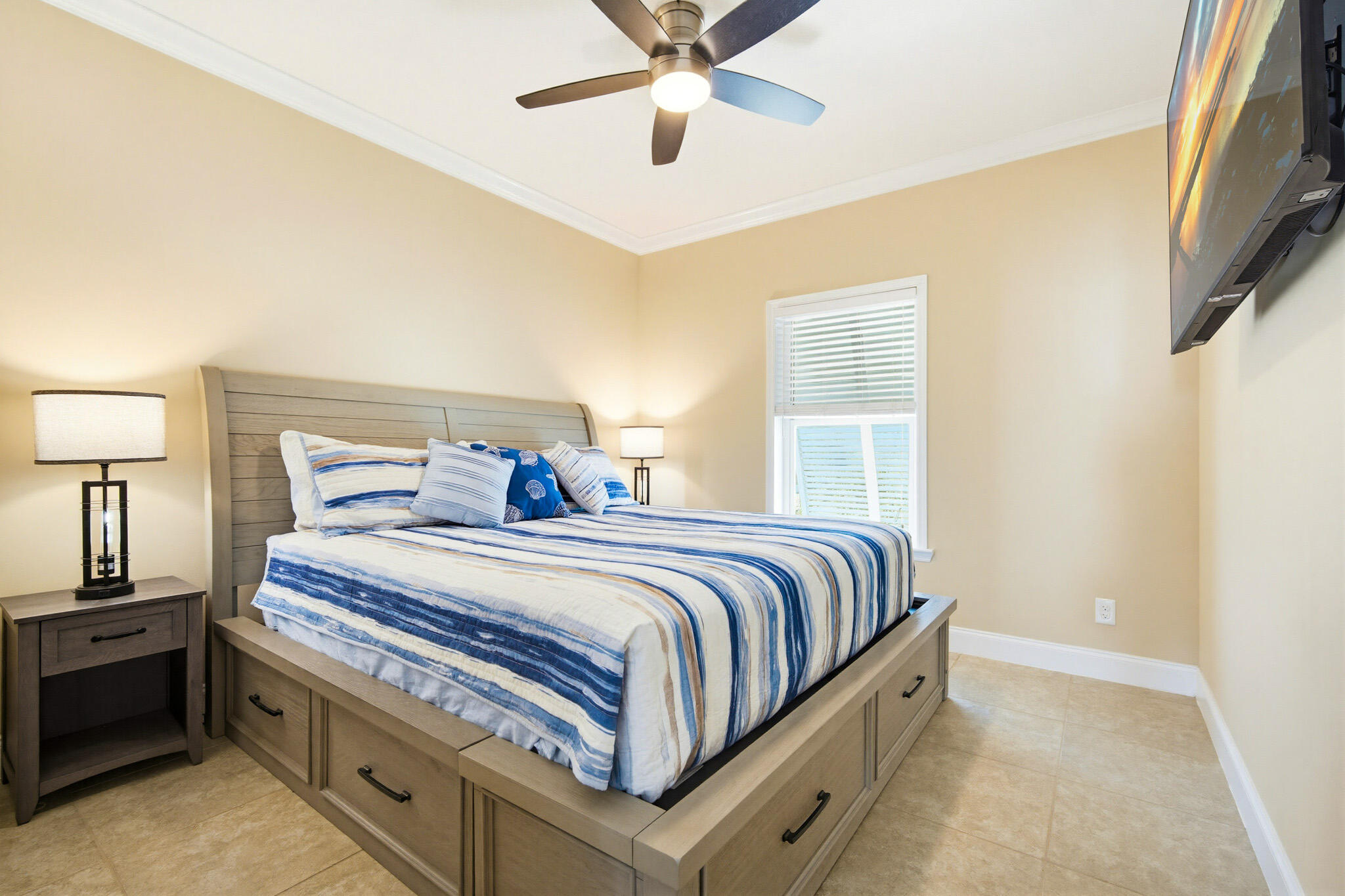 183 Star Lane Key West, FL 33040 - Photo 38 of 70 a bedroom with bed and a chandelier