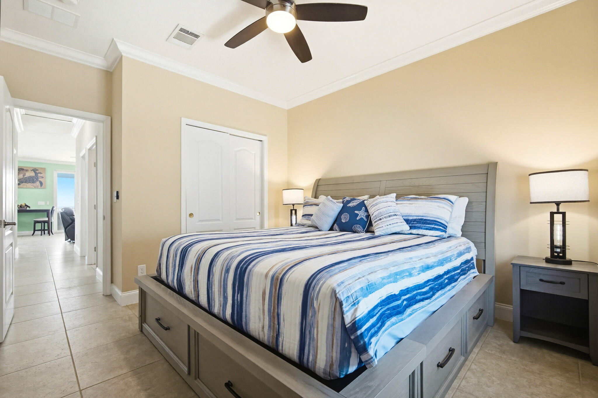 183 Star Lane Key West, FL 33040 - Photo 39 of 70 a bedroom with a bed and a lamp on table